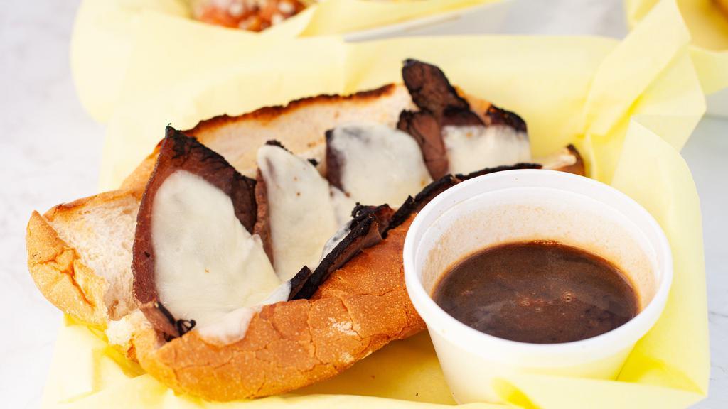 French Dip Au Jus Sandwich · Roast beef soaked in our delicious au jus with melted provolone.