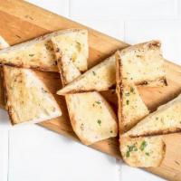 Garlic Bread · Fresh herb and garlic butter.