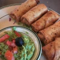 Bite Size Chimis (5) · Five bite-size chimis of your choice of beef or chicken with your choice of dipping sauce on...
