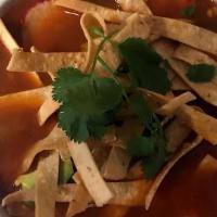Shrimp Tortilla Soup · In a spicy tomato broth with fried corn tortilla strips, monterey jack cheese, radishes and ...