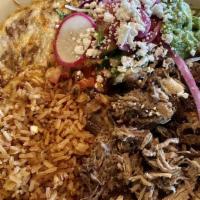 Pork Carnitas · Flavorful pork slow-cooked until tender and juicy. Served with our special avocado relish an...