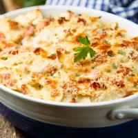 Baked Mac N Cheese · Cavatappi noodles in three cheese blend, topped with another layer of cheese and delicious b...