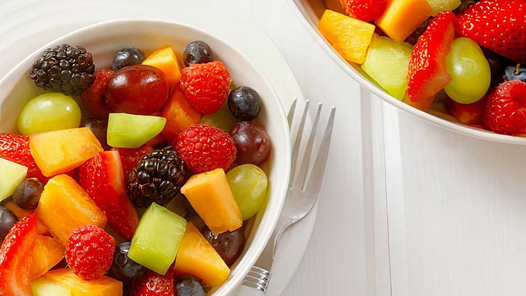 Fruit Bowl · *Typically* apples, strawberries, pineapple, banana rotating seasonal: grapes, blueberries.