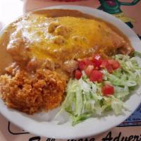 Stuffed Sopapilla · Bean stuffed Sopapilla with beef or chicken, smothered in chile with rice, lettuce, cheese a...