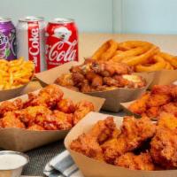 40 Wing Combo · Includes one wing style, four flavors, two sides, four drinks, and four dipping sauces.