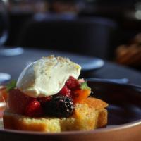 Olive Oil Pound Cake · Market fruit, citrus, crème anglaise, brown butter crumbs.