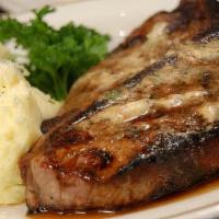 Porterhouse 28 Oz · USDA Prime.  Steaks are topped with our signature steak butter.  Served with garlic mashed p...