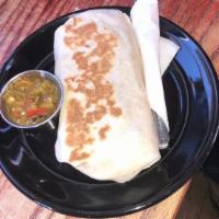 Breakfast Burrito · Flour tortilla with a savory filling. salsa available for an additional charge. choice of si...