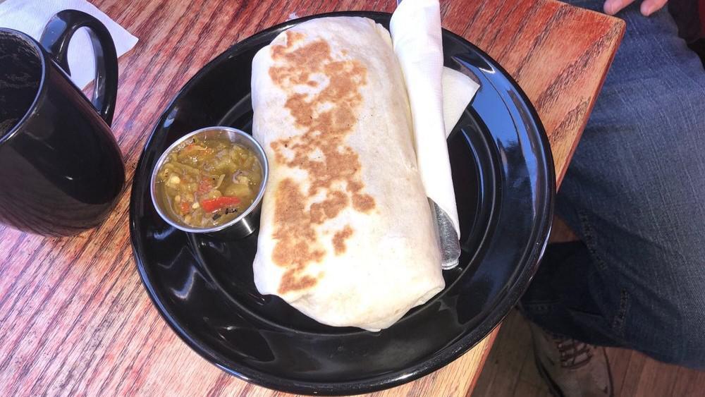 Breakfast Burrito · Flour tortilla with a savory filling. salsa available for an additional charge. choice of side.