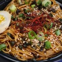 Sesame Scallion Noodle Nest · Vegetarian. Contains gluten. Can be made vegan by removing panda painted tea egg. 
This Shan...