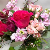 Cherry Strawberry  · A lovely bouquet of hot and soft pinks arranged with silver dollar  eucalyptus .