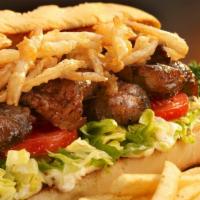 Bistro Sandwich · 6oz steak served with bistro sauce, shredded lettuce, tomatoes and onion straws on a bistro ...