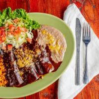 Enchilada Plate · Three enchiladas. Choice of cheese, chicken or beef served with beans and rice. Smothered wi...