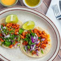 Tacos Al Carbon · No split checks for group of eight or more.

Chopped steak or chicken grilled with tomatoes ...