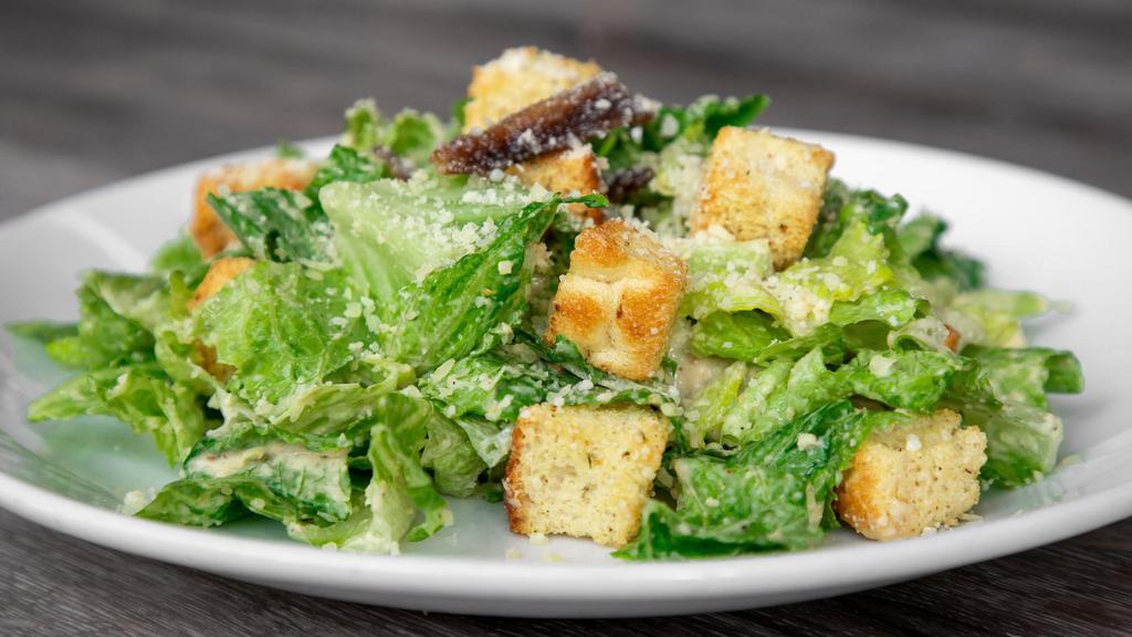 Caesar Salad · House Made Dressing and croutons. Anchovies