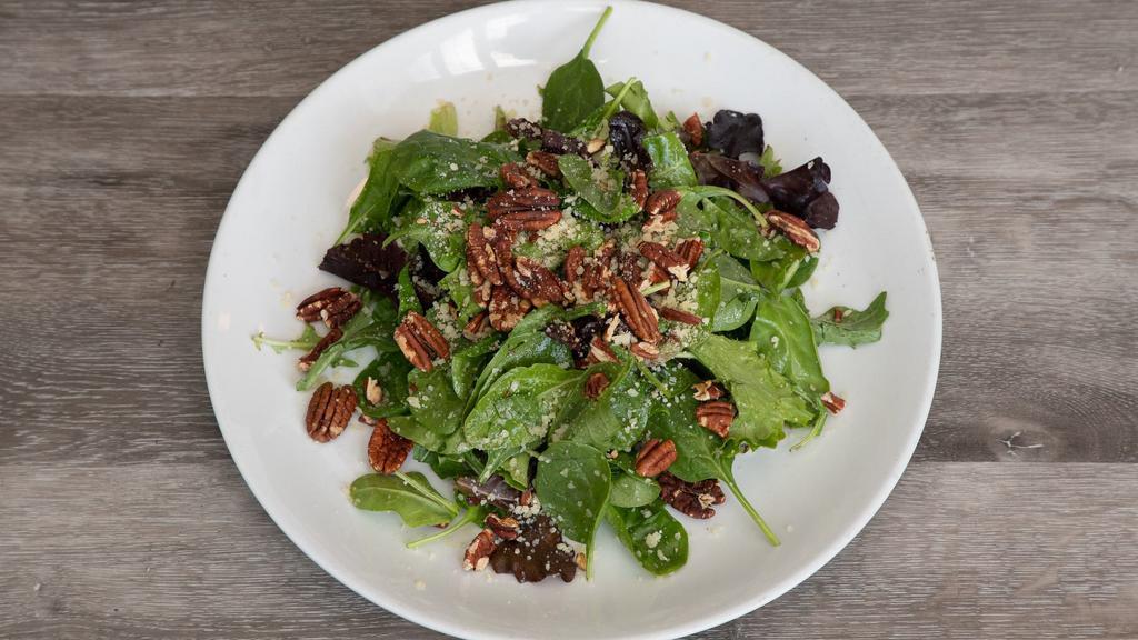 House Salad · Mixed greens with reisling vinaigrette, toasted pecans, and parmesan.