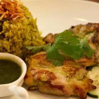 Khao Mok Gai · Boneless chicken thigh marinated with buttermilk, herbs and spices; served with a side of fr...