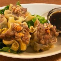 Pork Siu Mai · Steamed dumplings (4) Pork, water chestnuts, shiitake mushrooms, garlic, onions, cilantro, g...