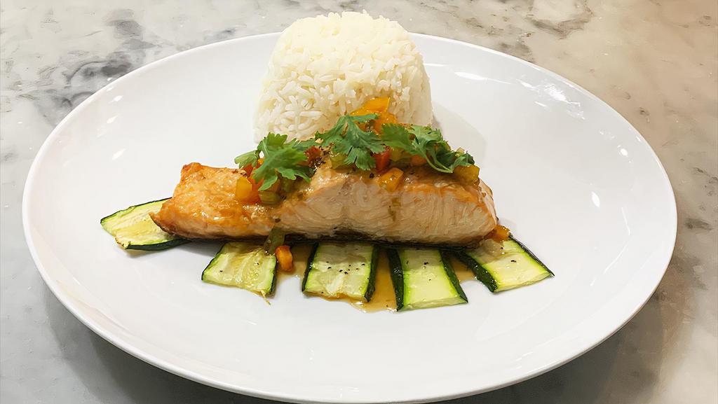 Salmon Three Flavors · 4 ounce salmon filet with tangy tamarind sauce, garlic, chili, bell pepper, basil; served on a bed of shaved zucchini, with a side of jasmine rice. (GF)