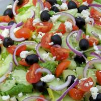 Greek Salad · Spring Greens, Tomatoes, Red Onions, Kalamata Olives, Cucumbers and Feta cheese with Vinaigr...