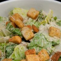 Caesar Salad · Chopped romaine and Parmesan tossed in Caesar dressing with house made croutons