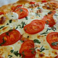 Margherita · Sliced mozzarella, sliced tomato, and basil with light marinara base.