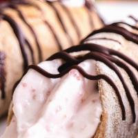 2 Dessert Vanilla Crème Chocolate Chip Cannolis · Two Cannolis with a hint of Cinnamon stuffed with Chocolate Chip Crème Filling and topped wi...