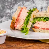 Smoked Salmon Salad · Our in house smoked salmon salad sandwich is served with lettuce and heirloom tomato. Pickle...