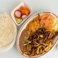 Steak Ranchero · Rice, beans, and salad. Choice of tortilla.