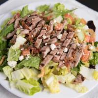 Black, Blue And Bacon · Grilled sirloin, spring mix romaine lettuce, blue cheese crumbles, bacon, cucumbers, tomatoe...