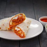 Texan Burrito · Red shredded chicken, sour cream, potato, and cheese.