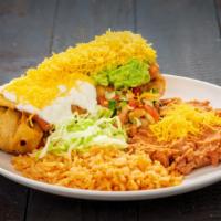 Chimichanga Plate · Shredded beef deep fried burrito. Served with rice and beans.