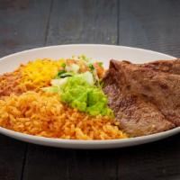 Carne Asada Plate · Two pieces of carne asada steak. Served with rice and beans.