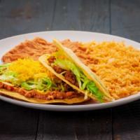 #1 Tostada And Taco · One bean tostada and one shredded beef taco. Served with rice and beans.