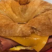 Ham, Egg, And Cheddar · On your choice of a Bagel, Croissant or English Muffin