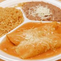 2 Cheese Enchiladas, Rice & Beans Plate · Topped with red enchilada sauce, lettuce, pico de gallo, and sour cream.