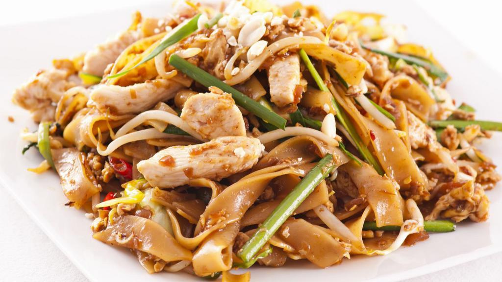 Chicken Pad Thai · Pad Thai with chicken, noodles, house sauce, bean sprouts, green onions, and roasted peanuts.