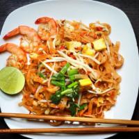 Shrimp Pad Thai · Pad Thai with shrimp, noodles, house sauce, bean sprouts, green onions, and roasted peanuts.
