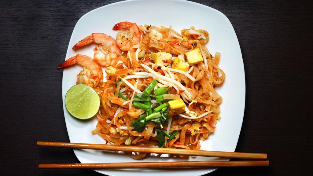 Shrimp Pad Thai · Pad Thai with shrimp, noodles, house sauce, bean sprouts, green onions, and roasted peanuts.
