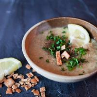 Lentil Soup · Red lentils and onions sautéed in olive oil garnished with parsley and cumin.