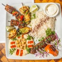 Meat Combo Plate · Three grilled kabobs: chicken, beef, lamb, kafta or vegetable. Served with basmati rice, dip...