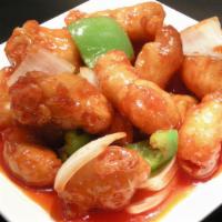 #107. Sweet & Sour Chicken · Crispy chicken with pineapple,onion,peppers and carrots.sweet sour sauce on the side.