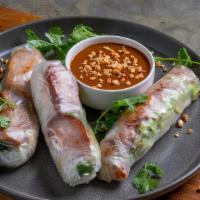 Pork Springrolls · Two rolls with braised pork belly, vermicelli noodles, shredded romaine lettuce mix, mint, b...