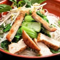 Vegan Pho (Delivery) · Vegan Pho broth with fried tofu, baby bok choy rice noodles, cilantro, yellow and green onio...