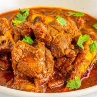 Lamb Vindaloo Curry Bowl · Spicy, and tangy curry simmered with potatoes, peppers, onions, roasted cumin, and chilies. ...