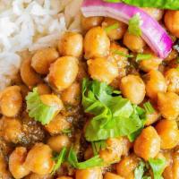 Chole Masala Curry Bowl · Stewed chickpeas and potatoes in our house curry sauce with spices. Served with basmati rice...
