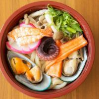 Seafood Udon Noodle · Assorted seafood and vegetable noodle soup.