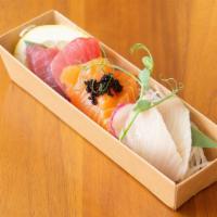 6 Piece Sashimi Apetizer · Tuna, salmon, and yellowtail.