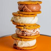 Four Ice Cream Sandwiches · Two chocolate chip cookies sandwiched around your choice of ice cream. Choose any of the fol...