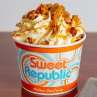 Caramel Almond Crunch · One scoop Salted Caramel Swirl, one scoop Almond Buttercrunch topped with salted caramel sau...